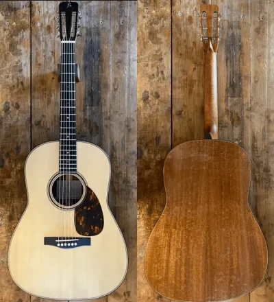 Acoustic guitar with light spruce top and mahogany back, shown front and rear.