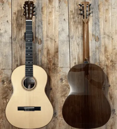 Acoustic guitar: front view with light wood top, and back view with dark wood body.