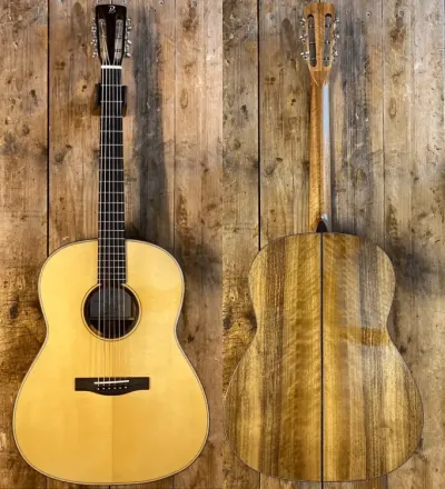 Front and back views of a natural wood acoustic guitar with a striped back.